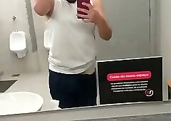 I almost got caught exposing myself in the gym bathroom, and the guys almost caught me.