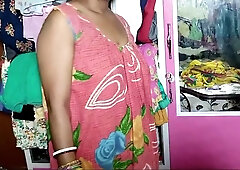 Indian couple explores bareback anal in a vibrant bedroom filled with floral fabrics