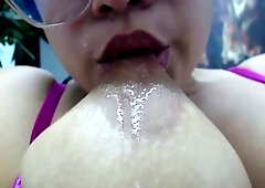 Seduce us with her lactating tits suck her nipples in a