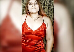 wet redhead in a red suit