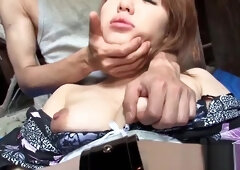Japanese babe is teased with fingers and cocks