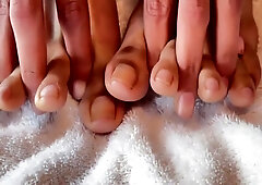 Viva Athena, tattooed brunette, teases her feet with clear nails in solo fetish play