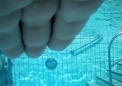 Wild amateur lovers getting naked in the public pool