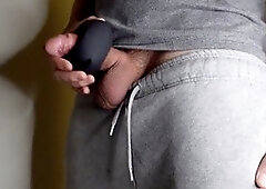 Close-up shots of bulging grey sweatpants with ball views