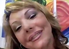 Slutty shemale in stockings fucks two guys in a threesome