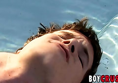 Appetizing teenage masculine stroking off at his personal pool