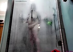 I’m in the shower wanting u to see my body throughout the steam. I clean the shower doors and tease u through my shower