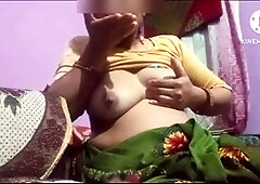 Big ass bhabhi Sexy Gunjan gives a delicious massage while fingering her untrimmed labia