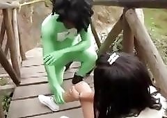 Naughty tranny loves sucking two dicks at the same time