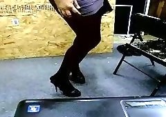 Cross-dresser dancing in black pantyhose