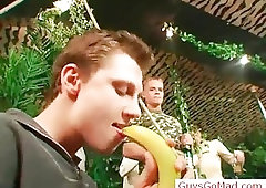 Drunk guys having fun with bananas