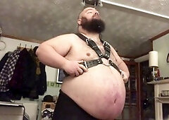 Chubby bear Hoggtubbs in a harness with a big belly and a gay funnel