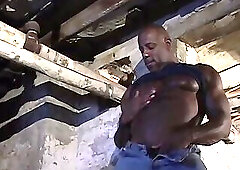 The big black dude jerks off in his secret haven at home the basement