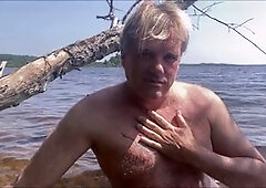 Naked at the lake enjoying some solo outdoor fun