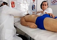 Two nurses are surprised by the patient's erection