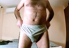 Earl Smile in panties showing off his hairy mature body in homemade gay content