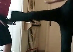 Masked slave braces himself for ballbusting punishment