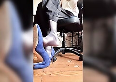 Sissy Claire plays with a sex toy whilst doing a footjob to a sex-toy in stockings !