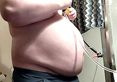 Extreme gay belly inflation as nearly two gallons of water fill up the stomach