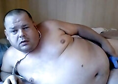 obese fellow stroking