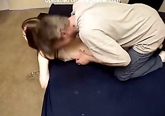 Brunette bound and kissed during intimate BDSM session