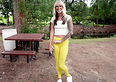 Katee V is getting picked up outdoors