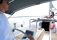 Sailor rescued the girl on his boat. She returns him a favour