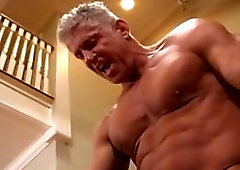 Musclemen sex on stairs