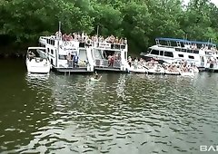 Kinky river bank party with lots of horn-mad nymphos shaking their bums
