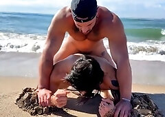 Muscle guys getting it on at the beach