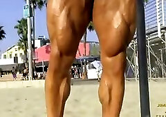 muscle stud poses on the beach