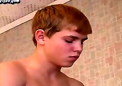 18 year old blond boy with a porn magazine masturbates and cums on the table