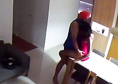 Elisa gets drilled over the table.