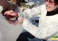 Brandi De Lafey Strokes Frosty the Snowman while Stranded in the Mountains