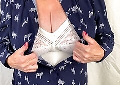 Mature Mrs. unwrapping her vintage corset while in heels and tights