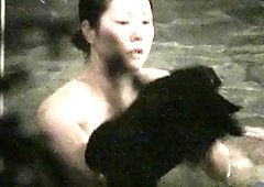 Stunning Japanese babe with perfect big hooters takes a bath