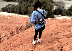 Asian college hitchhiker gives deep blowjob in desert canyon