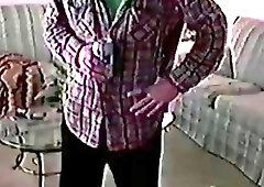 Older skater is lying on the couch while jerking off his throbbing pole