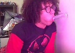 Gigantic femboy plays and deepthroats a massive dildo for Halloween fun