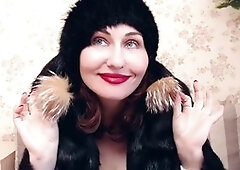 Mature mom indulges in fur fetish with fur coat, gloves, and hat