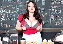 An awesome busty brunette Kate Marie shows off her naked goods