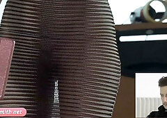 Russian dancer Jeny Smith teases with a slow striptease between office desks