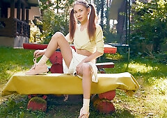 Cutie orgasms on a bench