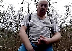 Bold masturbation by the big mustached man in the woods!