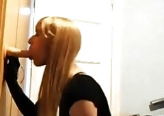 Luscious blonde shemale gives a sloppy blowjob to her dildo