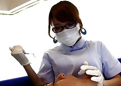 Busty Japanese dentist Aihara Mari pleasures a dude with her tits