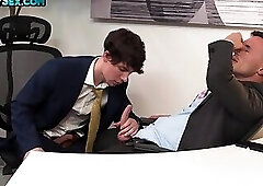 Suited stud bareback fucks tattooed athletic jock in office