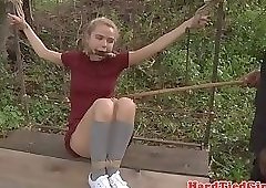 Dominated beauty punished outdoors