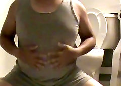 Riding a suction cup dildo while masturbating