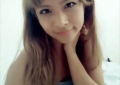 Teenage She-Creature being pretty with her cellphone